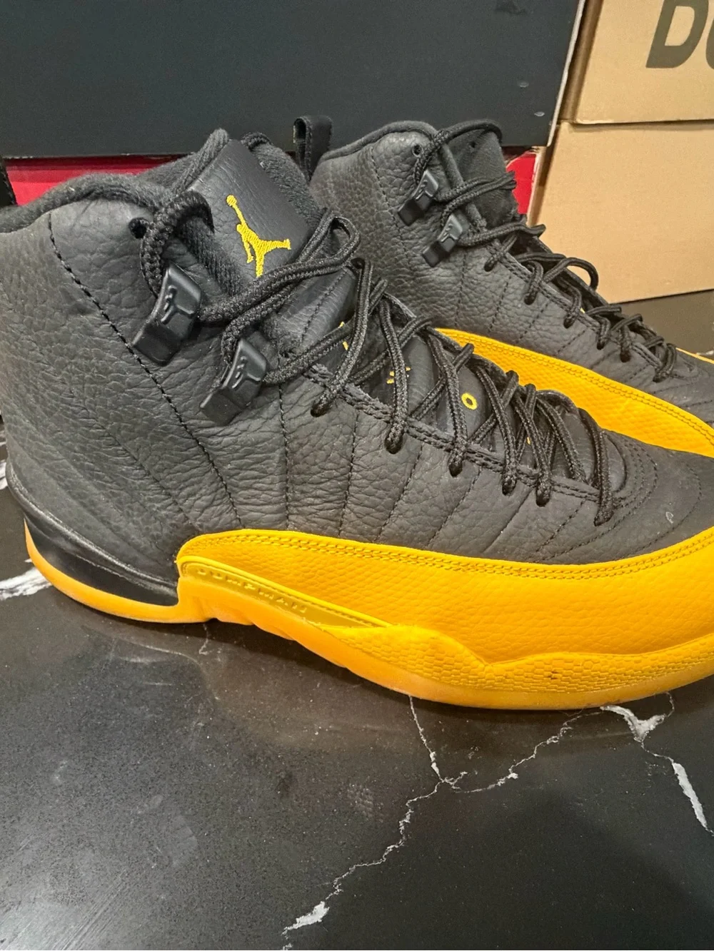 Jordan 12’s Men’s Basketball Sneakers in Black and Yellow